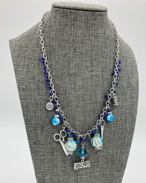 Cerulean / Purple Necklace with Sewing Charms 1