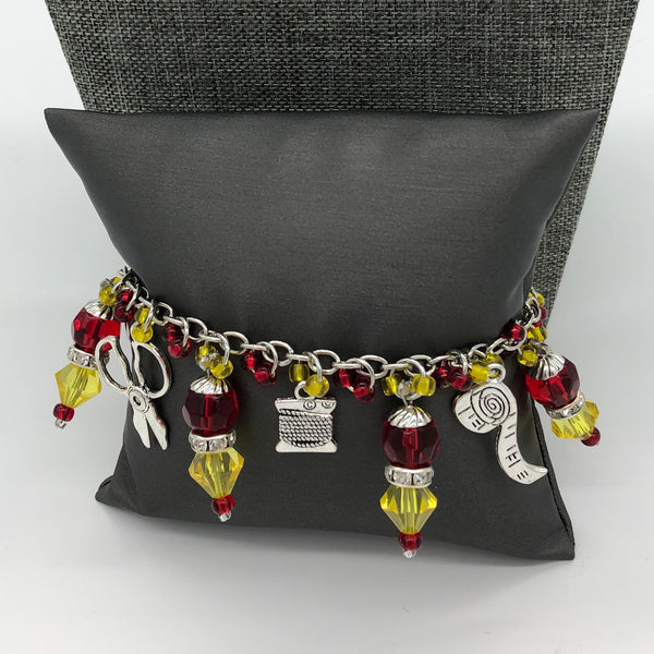 Red / Yellow Bracelet with Sewing Charms 1